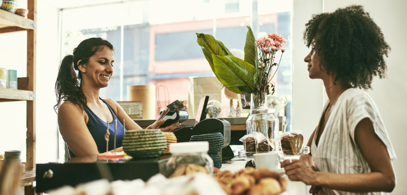 woman making purchase using credit card